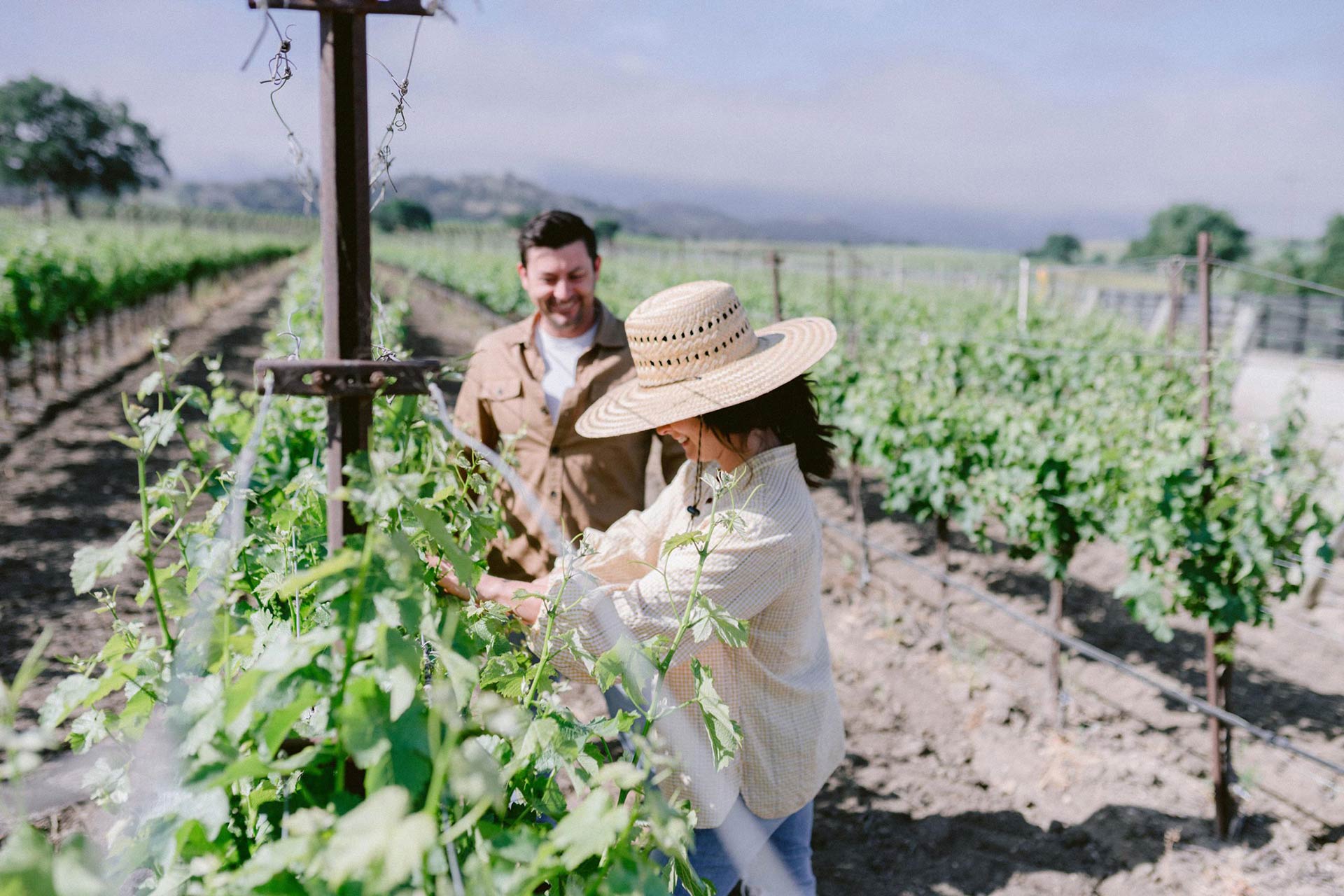 Founders Brit and Ryan Zotovich in their Santa Ynez Valley vineyard. © Dreamcôte Wines