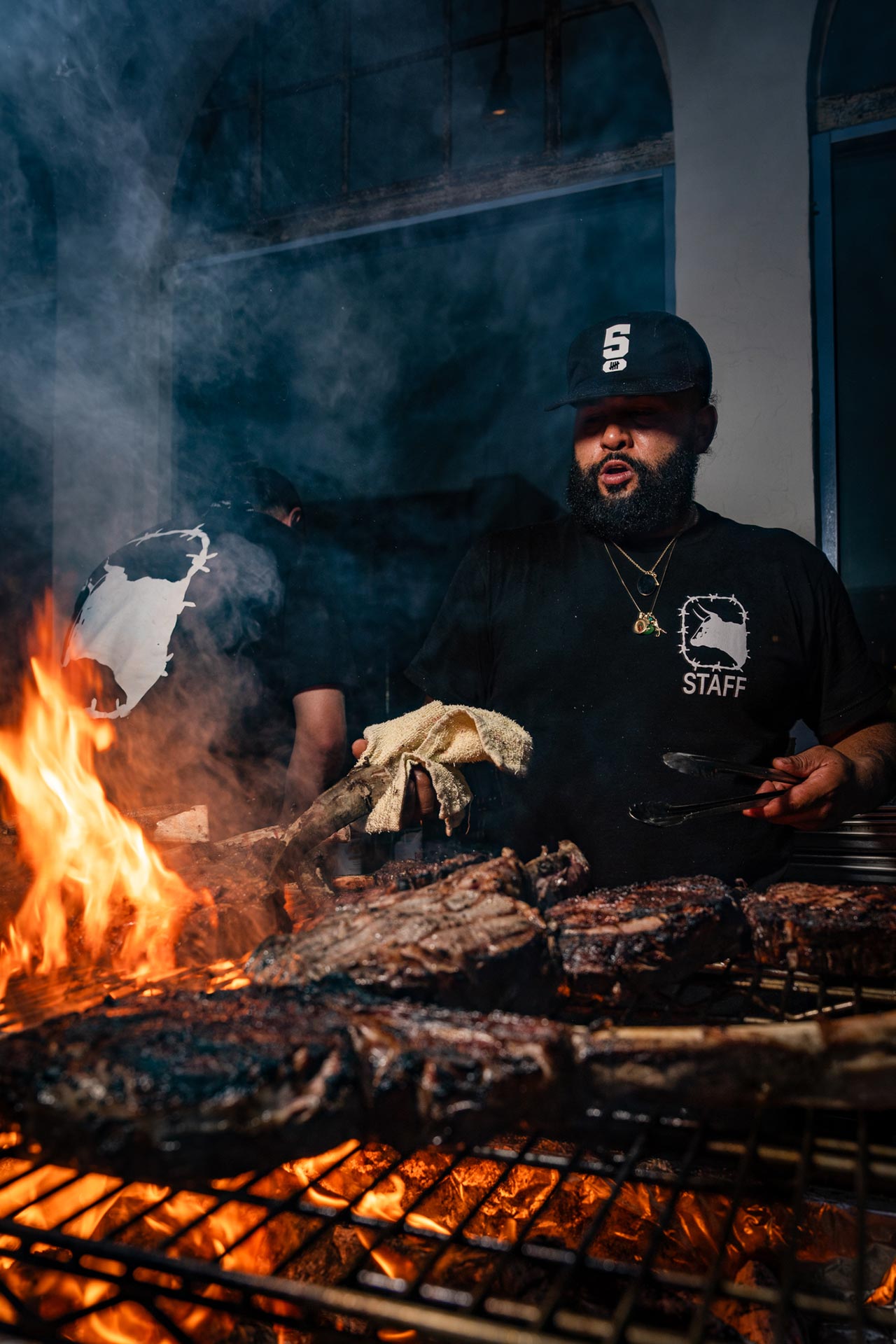 Chef René Andrade in his element at the grill. © Isaac Torres